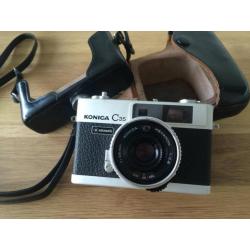 Konica C-35 met paraattas