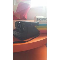polaroid camera met flitser