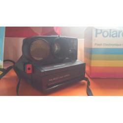polaroid camera met flitser